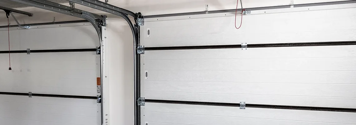 Fix Folding Garage Door Jerking in Fort Myers, Florida